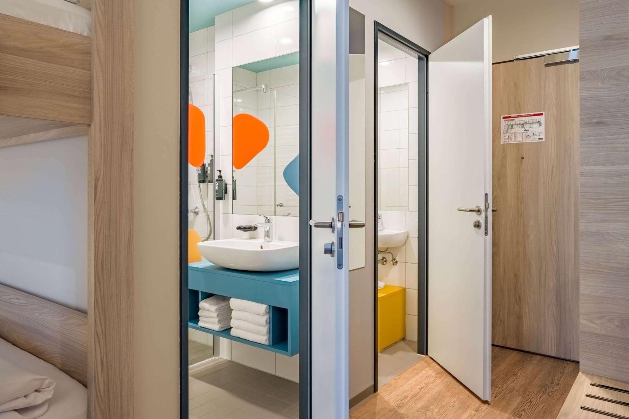Deluxe Zimmer mit 4 Einzelbetten